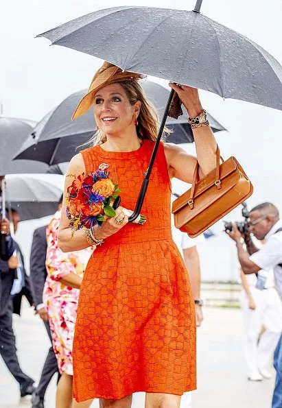 Queen Maxima- wore NATAN Dress. Governor Lucille Andrea George-Wout of Curaçao and Minister Eugene Rhuggenaath. Dia di Bandera