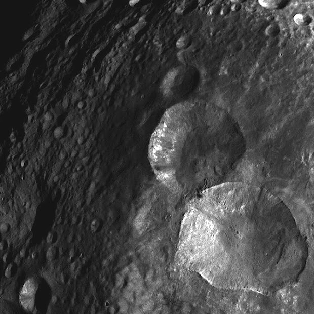 Close-up view of Snowman Craters on Asteroid Vesta