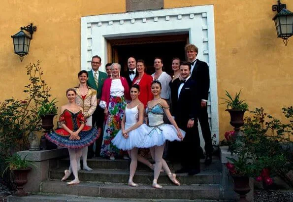 Queen Margrethe attended the World Ballet 2019 at Mollerup Estate. Queen's gold earrings and floral summer skirt