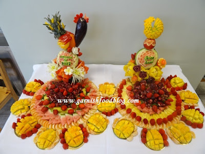 fruit carving arrangements rooster sculptures chenese new year fruit arrangements