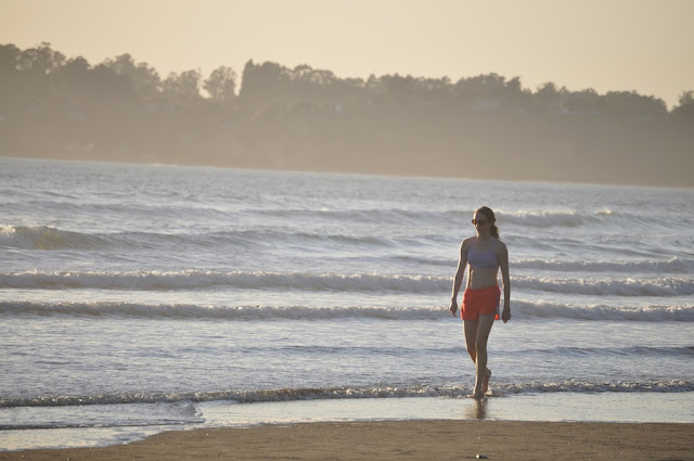 young girl taking a walk stinson beach california