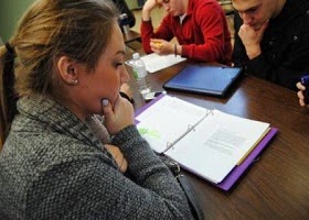 Students studying very hard in the library. Students studying very hard in the library.