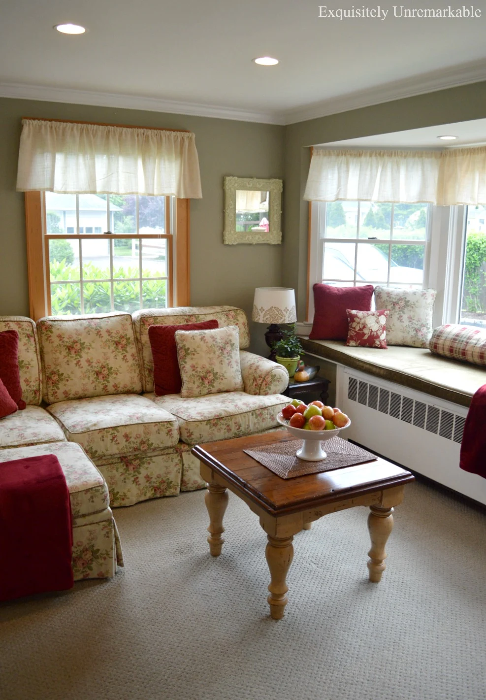 Cottage Style family room with large floral couch