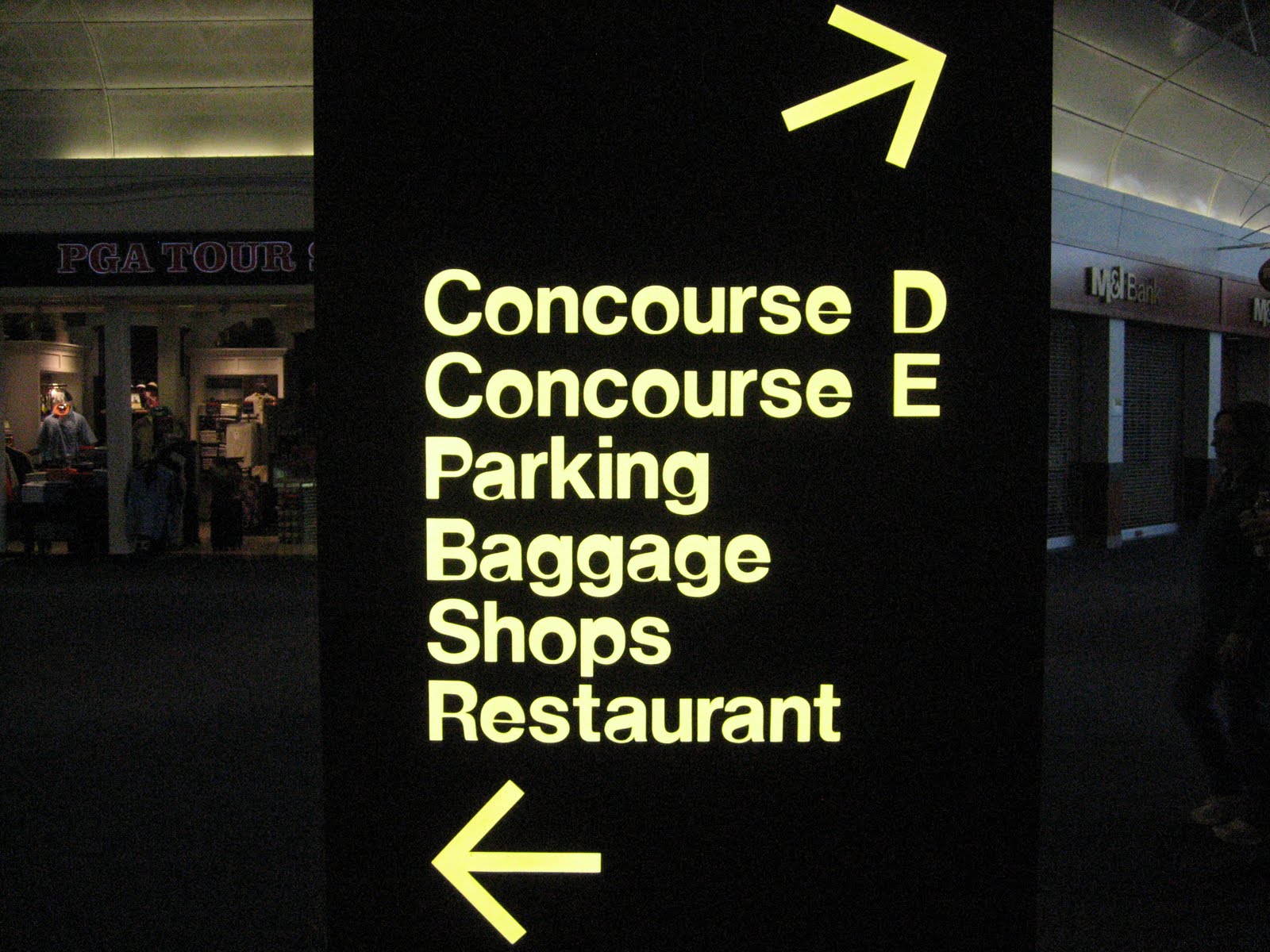 Modern Relics Directions Sign at MKE Airport