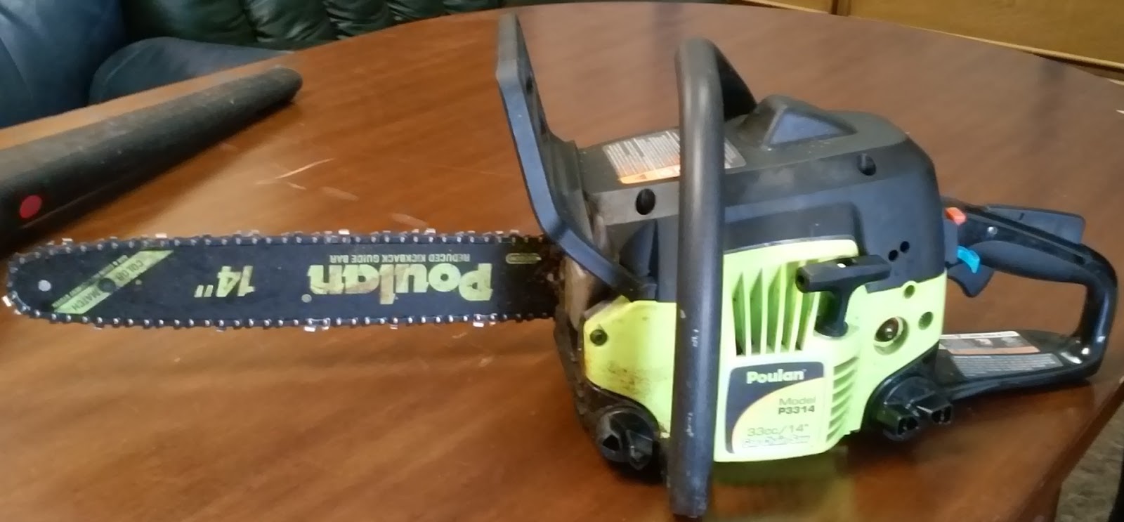 UHURU FURNITURE & COLLECTIBLES SOLD Poulan P3314 Chainsaw 40