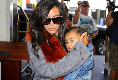 Kim Kardashian breastfeeding mama bare