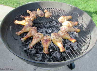 chicken drumsticks on charcoal grill