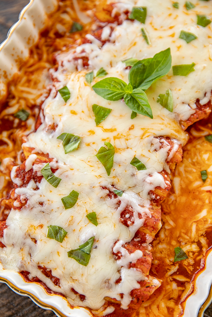 Easy Chicken Manicotti - so easy and seriously delicious! Everyone loved this easy pasta casserole and asked for seconds! YES! Manicotti noodles, chicken tenders, spaghetti sauce, water, garlic, Italian seasoning and mozzarella cheese. No need to boil the noodles or cook the chicken - it all bakes in the casserole dish. A family favorite! #pasta #casserole #manicotti #chickenrecipe Easy Chicken Manicotti - so easy and seriously delicious! Everyone loved this easy pasta casserole and asked for seconds! YES! Manicotti noodles, chicken tenders, spaghetti sauce, water, garlic, Italian seasoning and mozzarella cheese. No need to boil the noodles or cook the chicken - it all bakes in the casserole dish. A family favorite! #pasta #casserole #manicotti #chickenrecipe