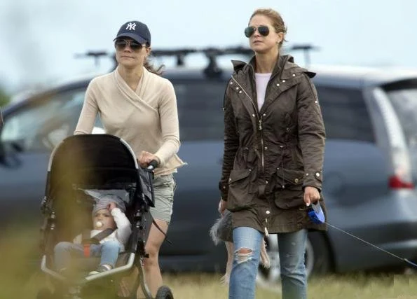 Crown Princess Victoria and Prince Daniel have been seen  walking near Solliden with Princess Estelle and Princess Madeleine and Christoper O'Neill