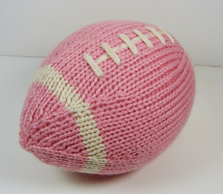 hand knit football stuffed pink white