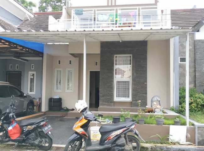 model batu alam rumah minimalis