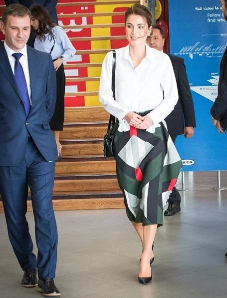Queen Rania wore Dior black calfskin leather pumps, Fendi pattern skirt, blouse and carried Fendi Leather bag