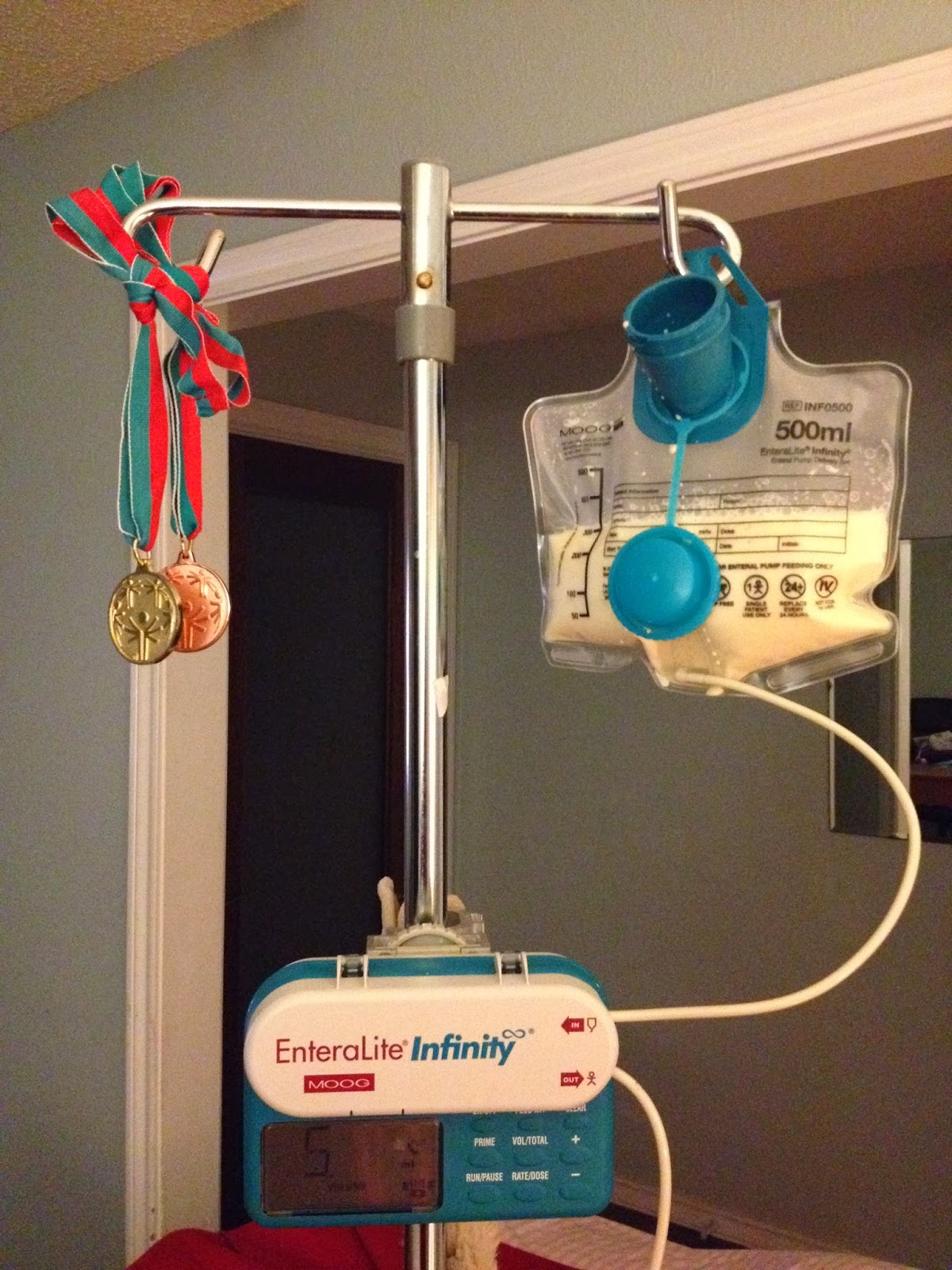 image of Special Olympics medals hanging from a feeding pole