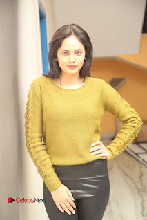 Actress Nandita Swetha Stills in Leather Pants at Janaki Ramudu Audio Launch  0043