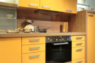 yellow kitchen cabinets picture