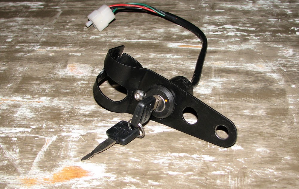 Crispy Cycles Key ignition switch mounting in headlight mounting ear