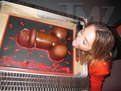 This Is a Picture of Miley Cyrus Eating a Penis Cake