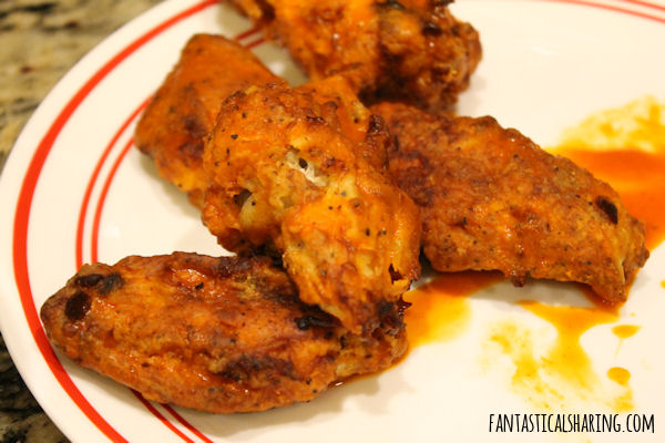 Air Fryer Hot Wings //  Get ready for the easiest and best wings you'll ever have with these air fried buffalo wings! #recipe #airfryer #wings #buffalo #appetizer #sundaysupper #superbowl #gameday
