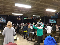 Glory of Zion-Corinth, TX people worshiping in a church service