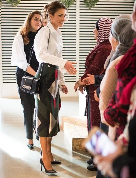 Queen Rania wore Dior black calfskin leather pumps, Fendi pattern skirt, blouse and carried Fendi Leather bag