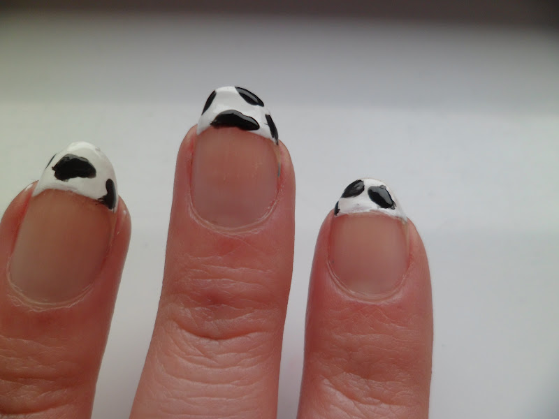4. Cow Print Nails: The Latest Trend in Nail Art - wide 1