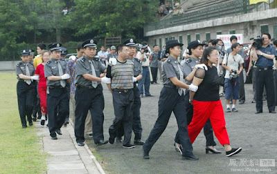 Death row inmates are escorted off the trial site to the execution ground. Death row inmates are escorted off the trial site to the execution ground.