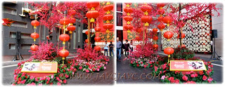 2012 CNY decorations: giant cherry blossom trees and red lanterns at the entrance of Pavilion KL