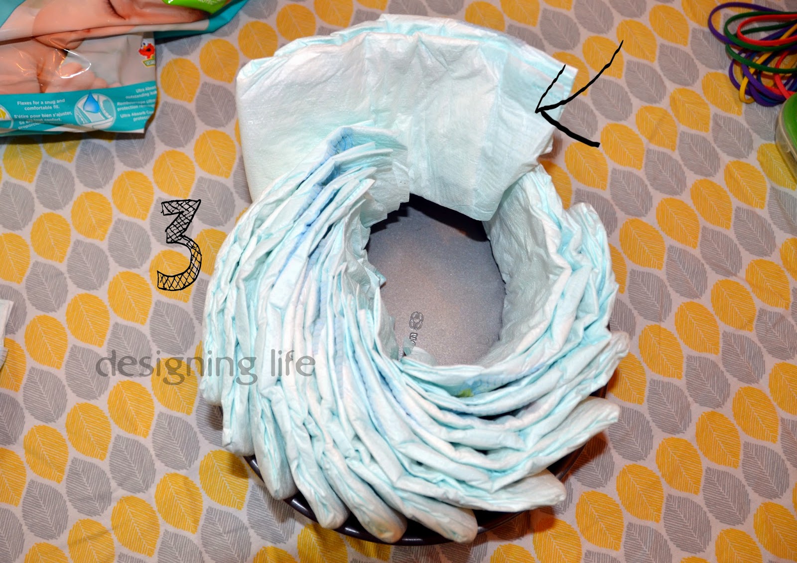 designing life A Diaper Bike!! variation to our very own Diaper Cake!