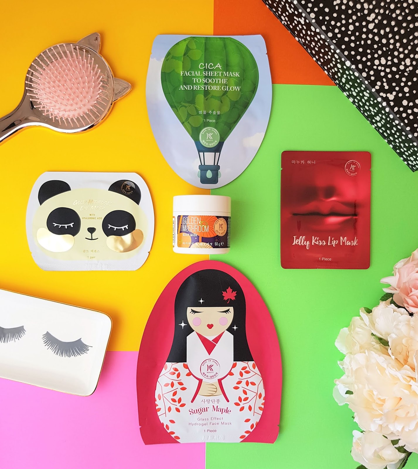 KBeauty By AVON Sheet Masks Flatlay A flatlay of 5 new KBEAUTY masks by AVON
