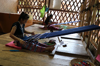 The Karen Ladies Making garments in Karen Village The Karen Ladies Making garments in Karen Village