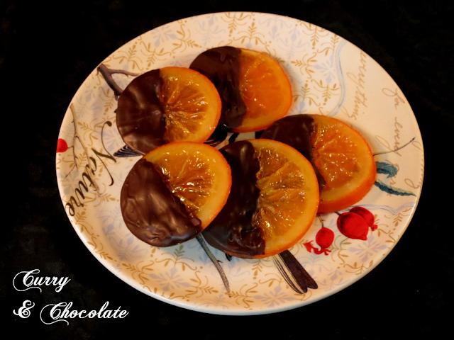 Naranjas confitadas y bañadas en chocolate