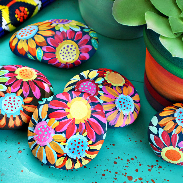 easy rock painting ideas for newbies - Mexican inspired flower rock painting design