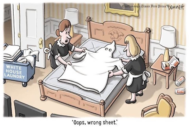 Maids making bed in White House see that, instead of a bedsheet, they have a KKK uniform.  One says to the other, 
