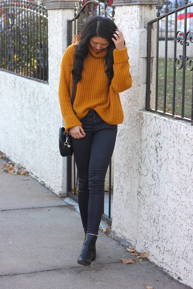 yellow jumper blue jeans