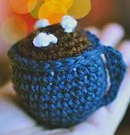 http://www.ravelry.com/patterns/library/hot-cocoa-mug-ornament