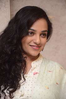 nitya menon at 100 days of love audio launch nitya menon at 100 days of love audio launch