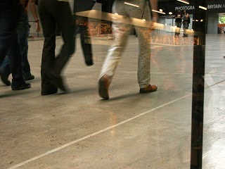 A picture of people hurriedly walking. A picture of people hurriedly walking.