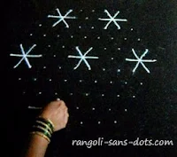 11-dots-flower-rangoli1.jpg