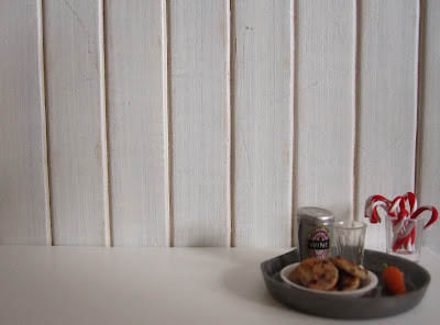 Modern one-twelfth scale tray for Santa, with a can of wine, a plate of cookies, a glass of candy canes and a carrot for the reindeer.