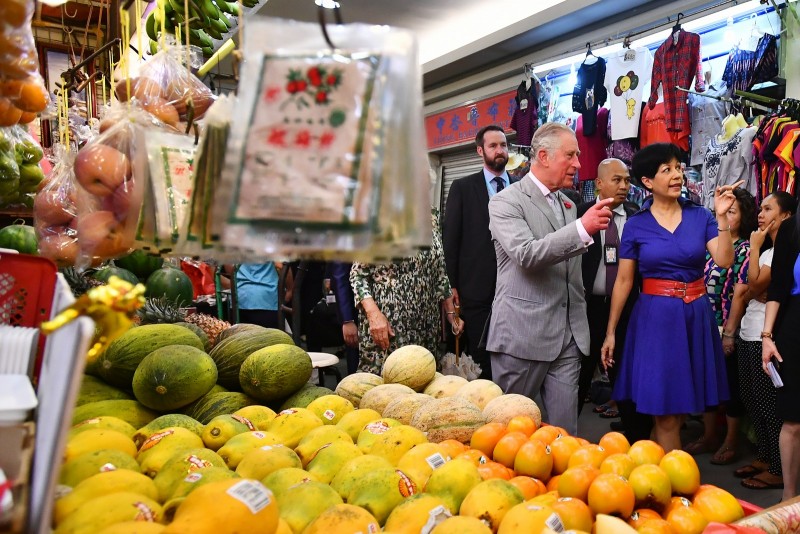 Prince Charles with MP Indranee Rajah at Tiong Bahru Market.
