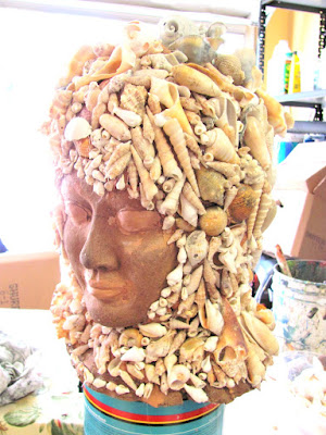 Sea goddess with shells statue