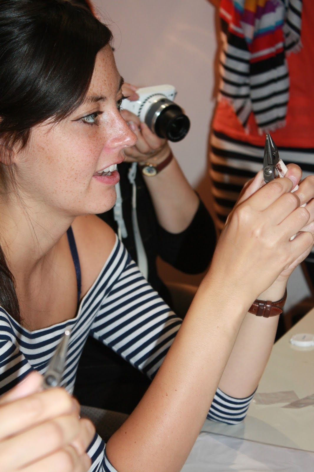 putting together jewellery at the Karma Moments launch party