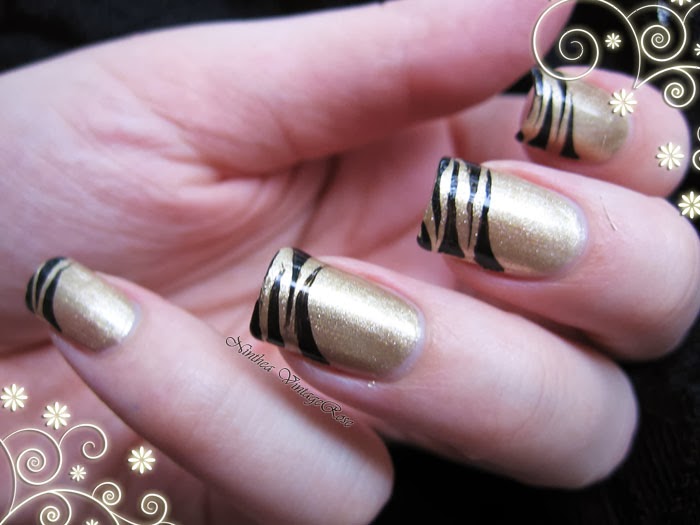 Secretly in love with nail polishes: Black and gold