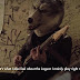 Man With Wolf Head Talks Passionately About Playing The Guitar (Video)