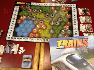 Trains board game in play