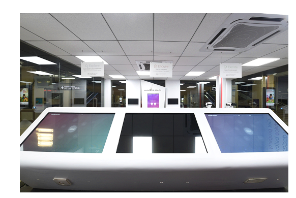 Image1: The above image shows touch tables (centre) for your property research, VR gadgets (Upper right corner) for a great virtual reality experience. Image1: The above image shows touch tables (centre) for your property research, VR gadgets (Upper right corner) for a great virtual reality experience.