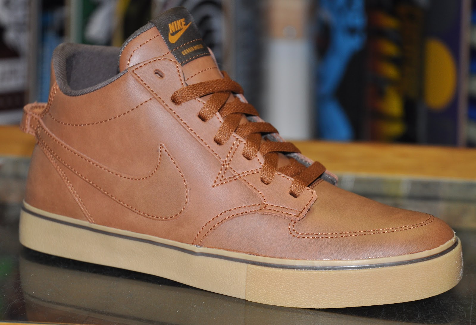 black nikes with brown sole