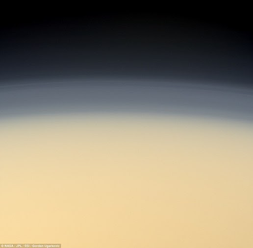 This image shows Titan's atmosphere. This object is the only world in the solar system have liquid on its surface than Earth that formed the sea or a lake. But here the liquid is not water but methane and ethane liquid. This image shows Titan's atmosphere. This object is the only world in the solar system have liquid on its surface than Earth that formed the sea or a lake. But here the liquid is not water but methane and ethane liquid.