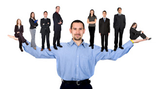 Corporate guy with other people on his shoulders... that's a dev, not a manager.
