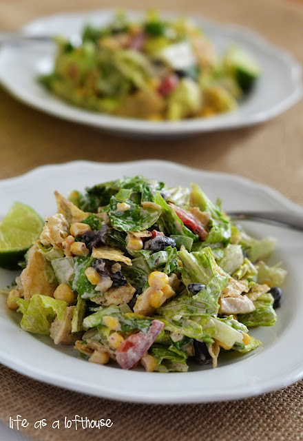 This Southwest Chicken Chopped Salad is filled with grilled chicken, romaine lettuce and lots of colorful veggies tossed in a taco-ranch dressing. Life-in-the-Lofthouse.com
